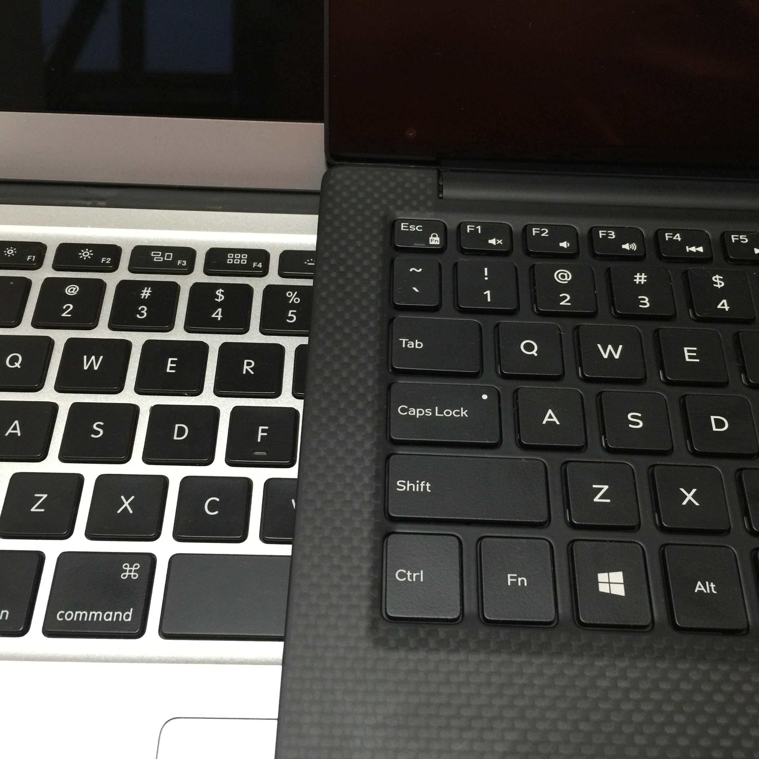 Macbook Air (left) vs Dell XPS 13 (Right)